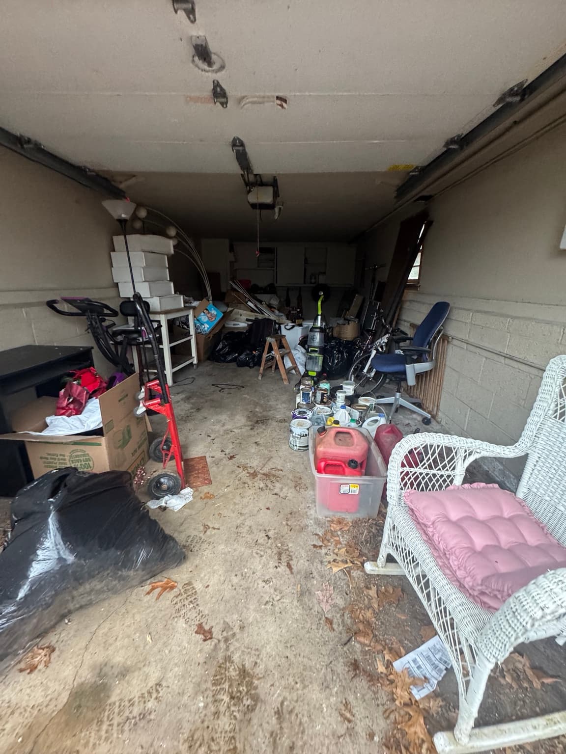 Cluttered garage before a Junkfire cleanout